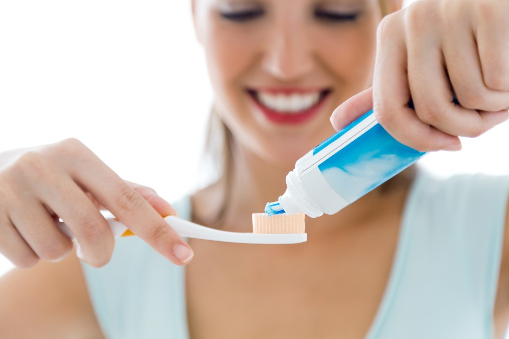 A Happy Smile: Keep Your Teeth Healthy- toothbrush gently