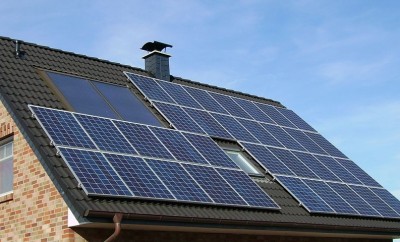 solar panels in a brick house roof