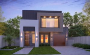 Modern two story home with outside house lights on