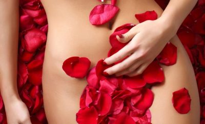 lady covered in rose petals