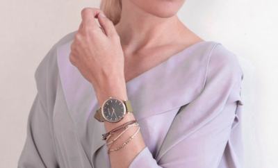 woman front shot showing her wrist watch