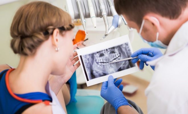 Benefits Of Cosmetic Dentistry And Their Corresponding Procedures- dental implant