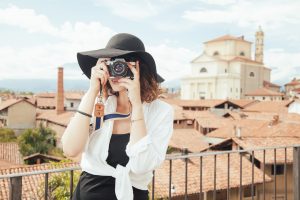 lady with camera on travel