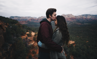 Couple embracing on a mountain top