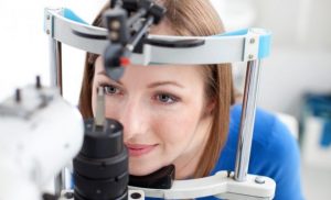 woman having an eye test, optometrist