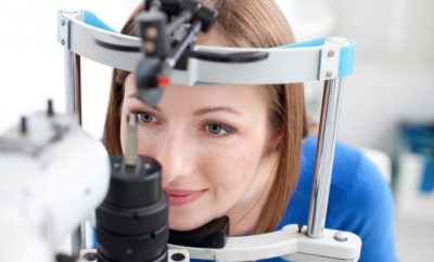 woman having an eye test, optometrist