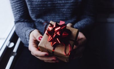 woman holding a gift in her hands