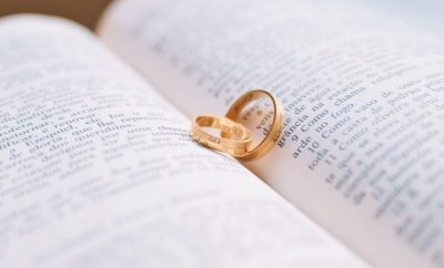 wedding rings on a bible