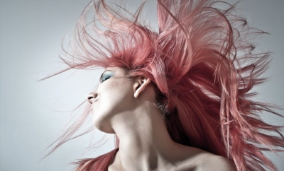 woman with pink blowing hair