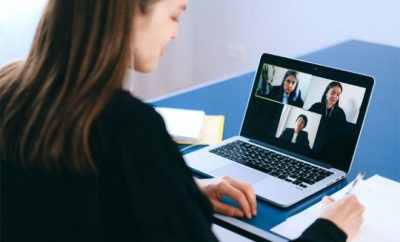 woman conducting a online meeting/interview