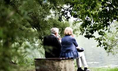 Senior couple enjoying a view and a glass of wine