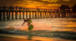 Man surfing in a Florida's beach