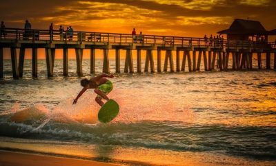 Man surfing in a Florida's beach