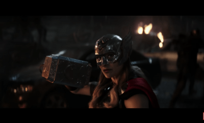 NAtalie Portman in Thor holding a hammer