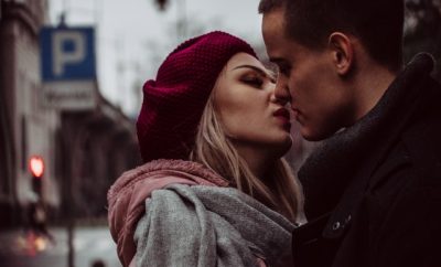 couple kissing on the street