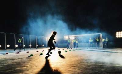 Soccer players training at night