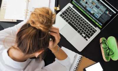 Woman looking stressed at work