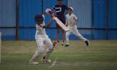 Kids playing cricket