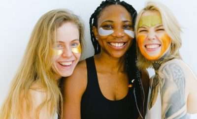 Three women with face patches