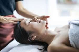 A lady having a head massage