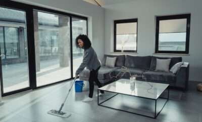 Woman cleaning her house's floor