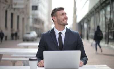 Man working on his laptop outside