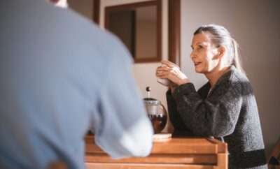 Older couple at the table discussing plans