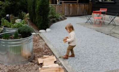 Toddler playing in the backyard