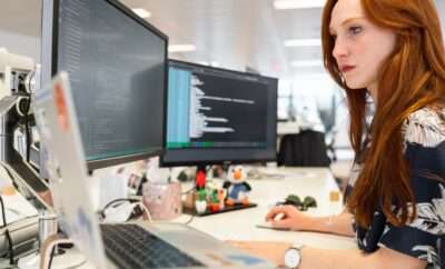 Woman working on her laptop in IT